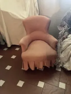 Vintage dusty pink armchair with decorative skirt