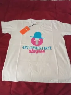 White T-shirt Art Comes First with orange tag