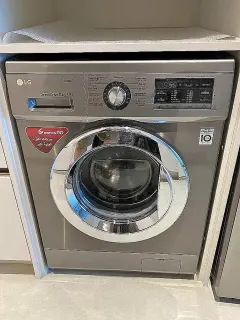Lave-linge frontal LG gris argent