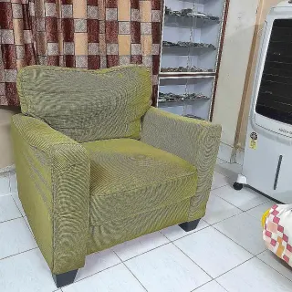 Sillón de tela acanalada
