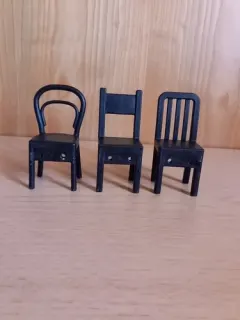 Set of three black miniature chairs for dolls