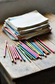 Lot coloured pencils + notebooks - for school