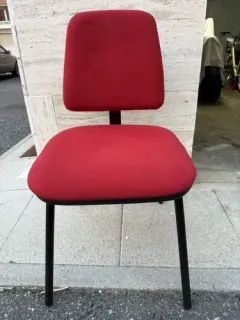 Red chair without wheels black metal frame