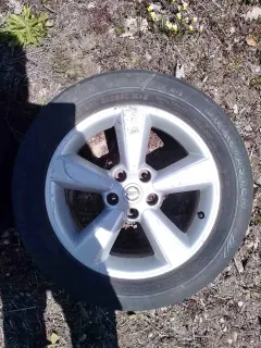 Nissan alloy wheel with 195/65 R15 tyre