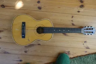Vintage natural wood acoustic classical guitar
