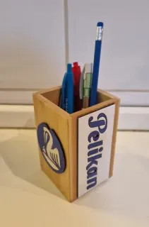 Pelikan bamboo pen holder with pens and pencils