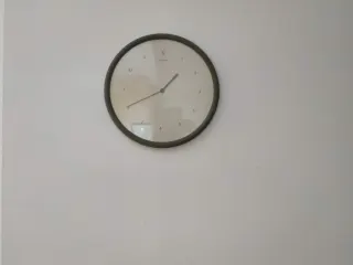 Round olive green wall clock - modern