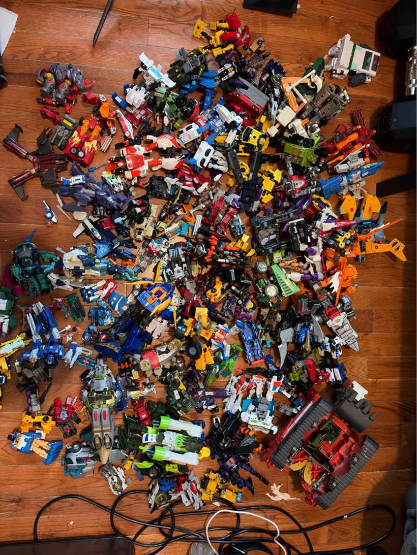 Box of assorted old kids toys robots