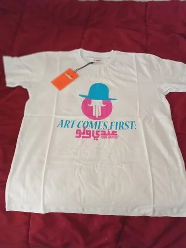 White T-shirt Art Comes First with orange tag