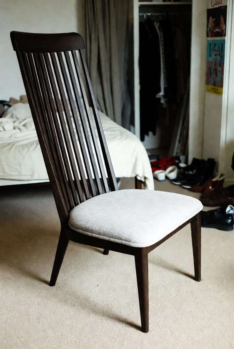 Dark walnut dining chair - slatted backrest