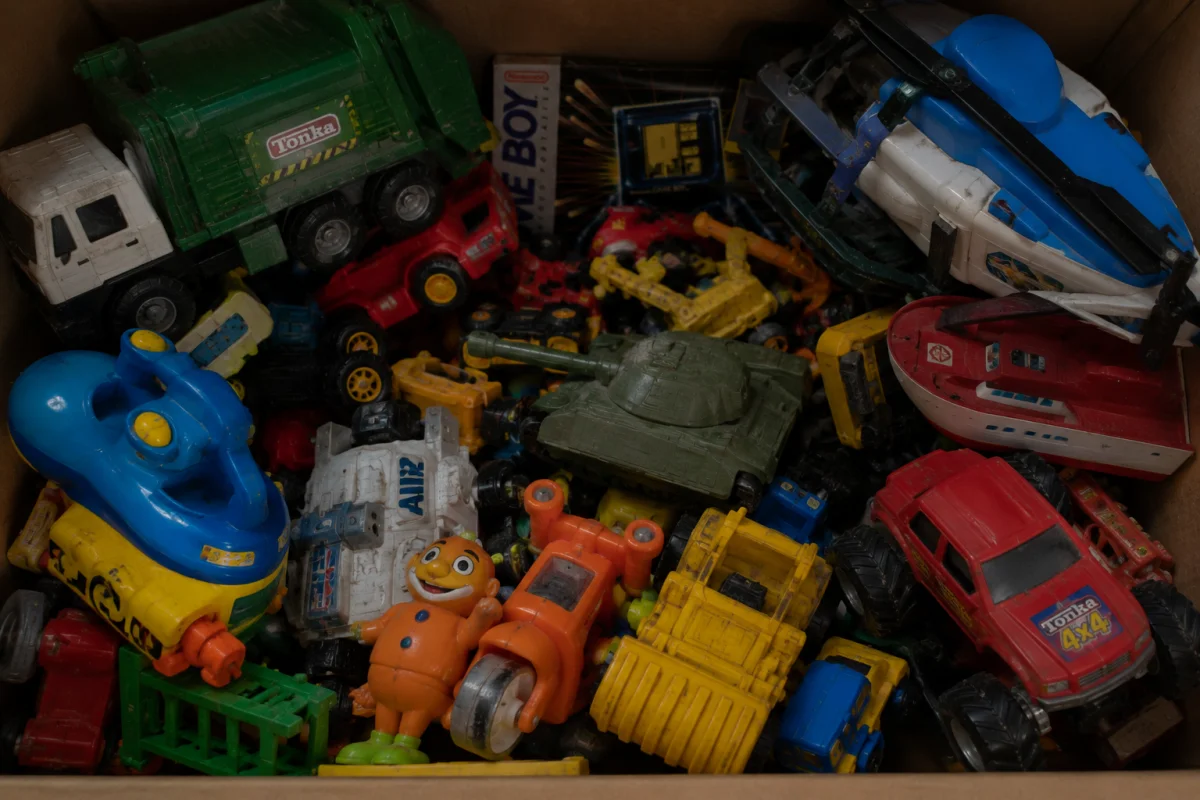 Cardboard box full of old toys