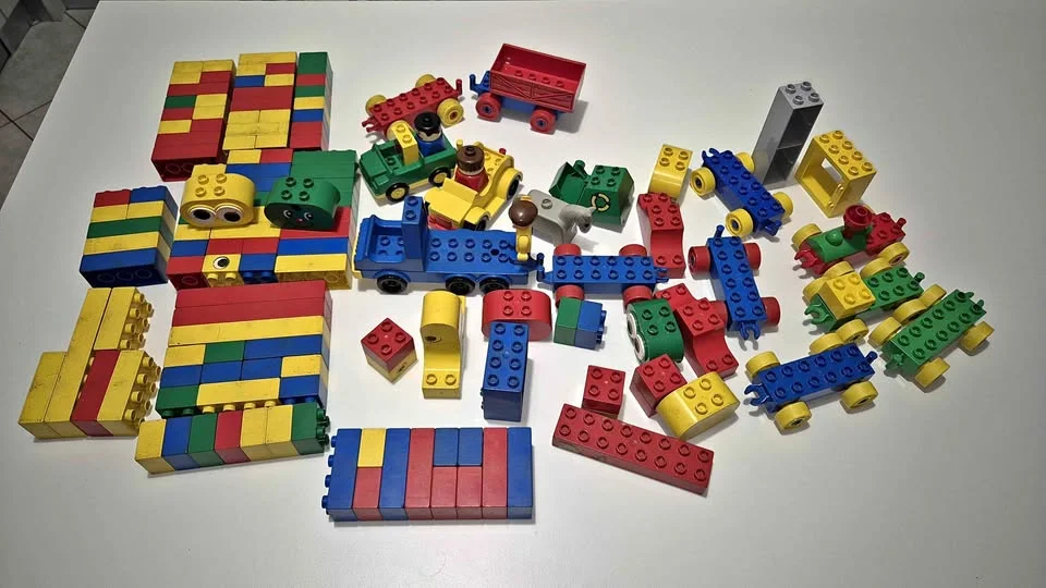Mixed LEGO DUPLO lot - bricks, characters and vehicles