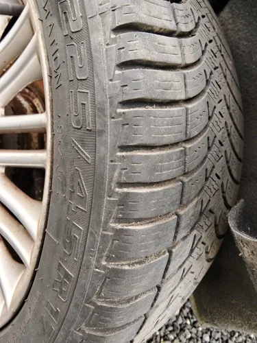Used tire mounted on alloy rim