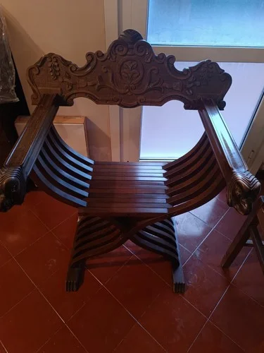 Savonarola wooden armchair with decorative carvings
