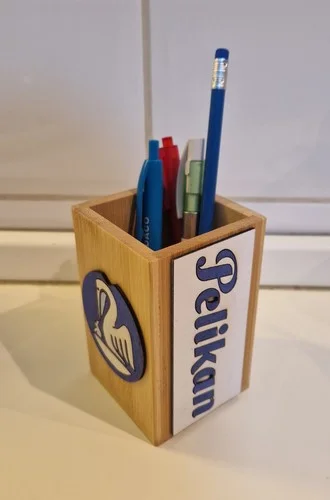 Pelikan bamboo pen holder with pens and pencils