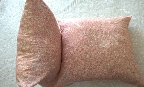 Pair of dusty pink cushions for sofa or bed