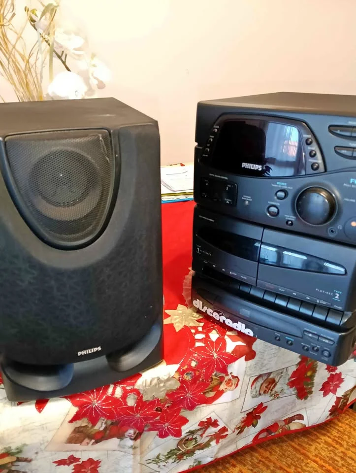 Black Philips stereo with amp and subwoofer