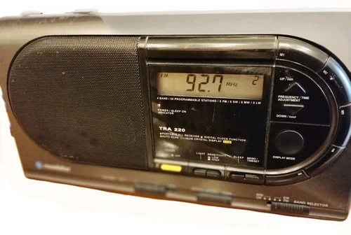 Portable digital multi-band clock radio