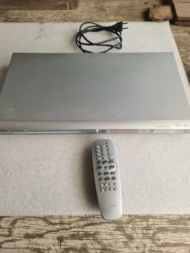 Silver Philips DVD player with remote