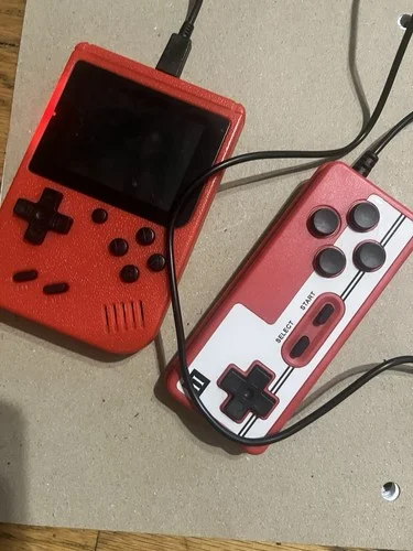 Red mini portable console with extra controller